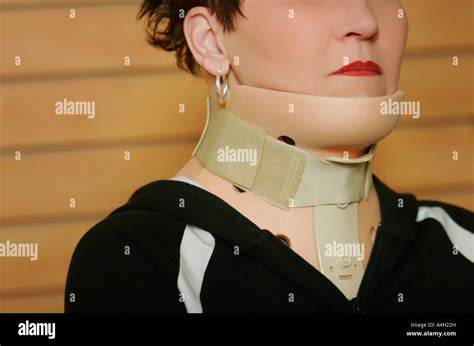 Woman Wearing A Neck Brace Stock Photo Alamy