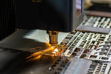Laser Cutting Of Metal Sheet With Sparks Fly Stock Image Image Of