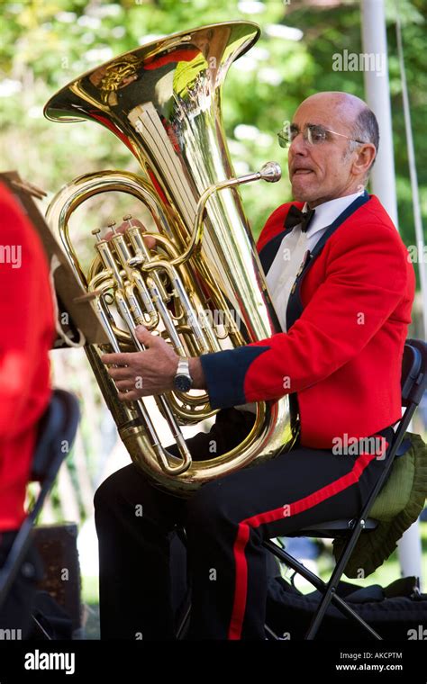 A Tuba Player In The Band At The Rhs Chelsea Flower Show London