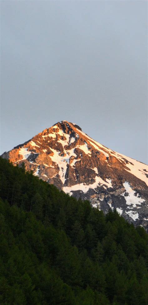 Download Wallpaper 1440x2960 Mountain Peak Sunset Glow Samsung