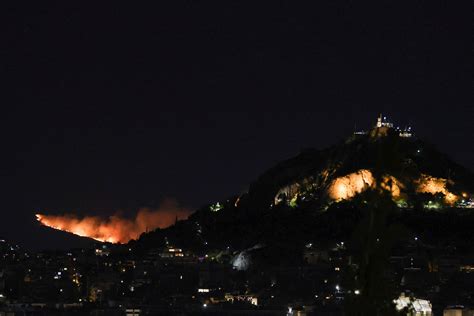 Greek Wildfire Rages Near Athens Homes Hospital Evacuated Reuters