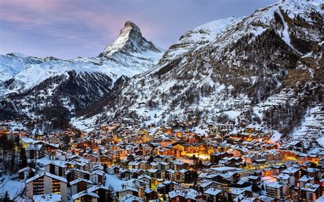 Aerial Photography Of Village And Mountain At Daytime Switzerland