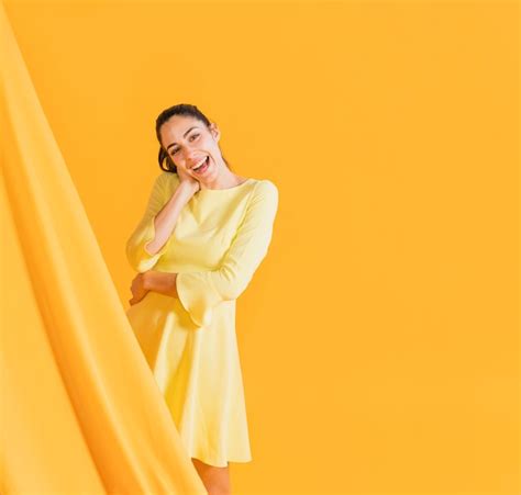 Free Photo Happy Woman In A Yellow Dress