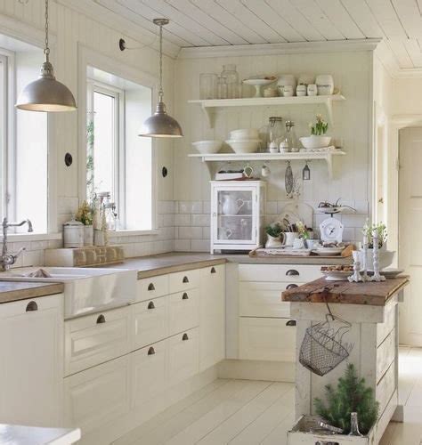 The island, made from reclaimed barn wood, is aactually a distressed. Budget Shabby-Chic Style Kitchen Design Ideas, Renovations ...