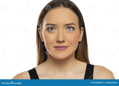 Portrait Of A Young Beautiful Woman With Blue Eyes And Makeup Stock