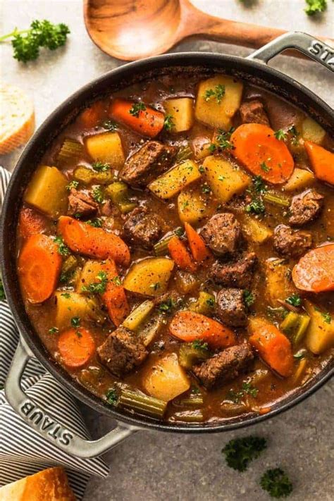 2 lbs beef stew meat, 3 tblsp flour, 2 tlbsp olive oil, 1 can diced tomatoes, 1 can beef broth, 1/2 cup good red wine, 4 chopped carrots, 2 stalks celery, 1/2 cup mini onions, 2 cubed potatoes, 3/4 tsp dried thyme, 1 tlbsp sugar, 1/2 tsp minced garlic, 2 bay leaves, 2 tlbsp dijon mustard, pinch of basil, salt/pepper. Instant Pot Beef Stew - A Healthy and Hearty Slow Cooker Stew Recipe