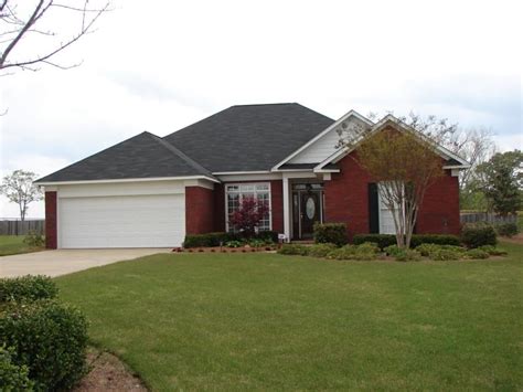 Blue looks amazing on shutters, doors and fascia. Photos red brick white trim