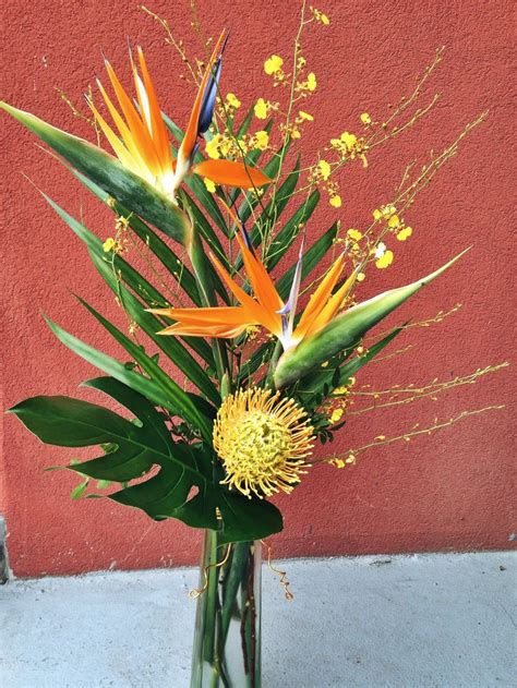 Tropical Arrangement Including Birds Of Paradise Oncidium Orchids And