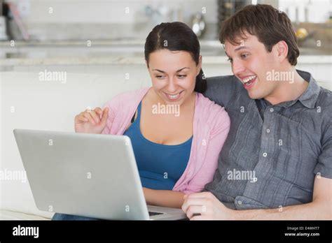 Two People Having Fun With The Laptop Stock Photo Alamy