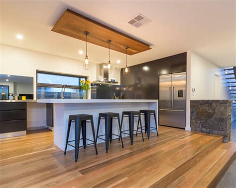 In the kitchen, the bulkhead may only be decorative, but usually encloses necessary wiring, plumbing or vents. Add Design Style with a Bulkhead — Calgary Custom Home ...