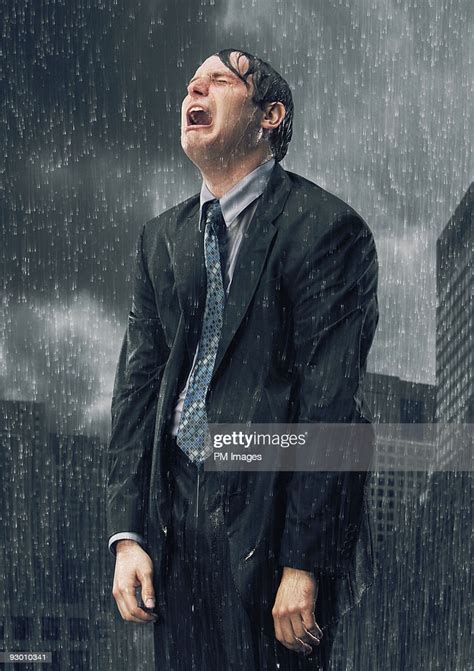 I may be a fool. Businessman Crying In Rain Stock Photo | Getty Images