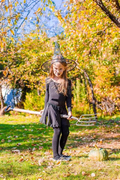 Happy Little Girl With Broom Wearing Witch Costume Stock Image Image