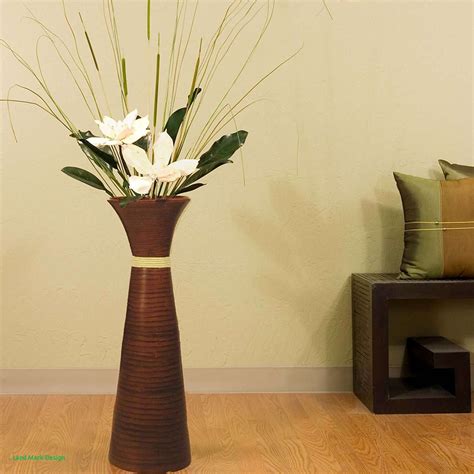 Какие искусственные цветы можно держать дома в напольной вазе 86 фото