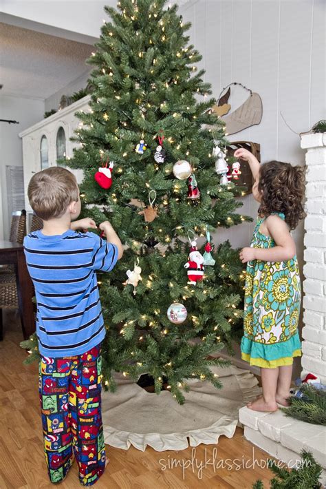Kids Decorating Christmas Tree Flawssy