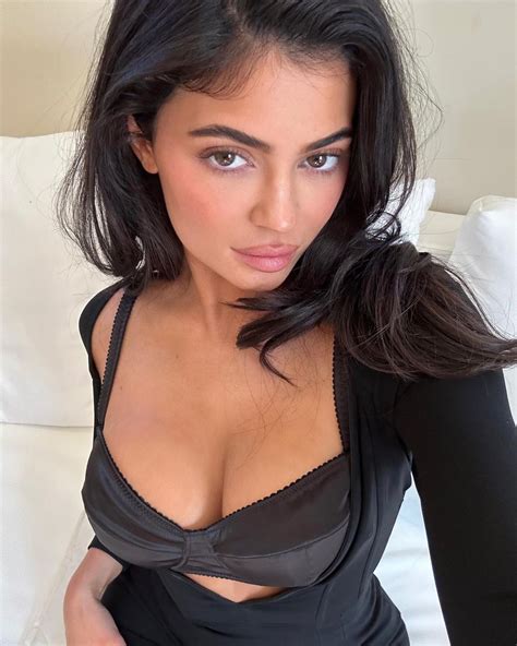 Kylie Jenner Nearly Busts Out Of A Black Silk Bra In Very Racy New