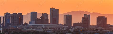 Downtown Phoenix Arizona Skyline With Famous Camelback Mountain At