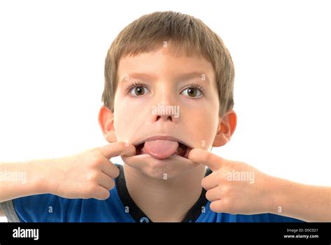 Little Boy Sticking Out Tongue With Funny Face Stock Photo Alamy