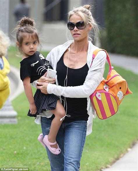 Denise Richards Holds Daughter Eloises Hand While Energetically