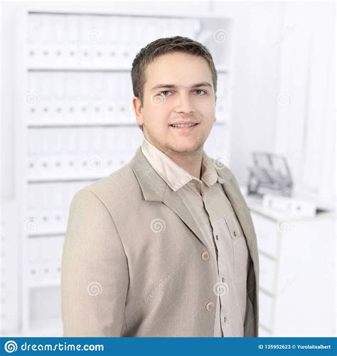 Portrait Of A Young Promising Employee Of The Company. Stock Image ...