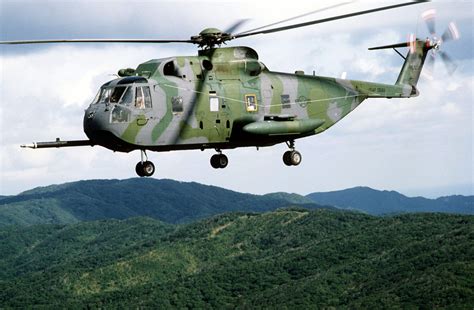 An Air To Air Left Side View Of A Ch 3 Jolly Green Giant Helicopter