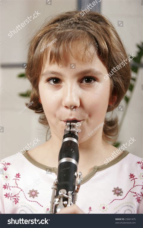Young Girl Playing Clarinet Stock Photo 23691475 Shutterstock