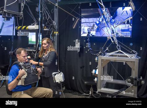 nasa virtual reality lab technician evelyn miralles prepares astronaut col tyler nick hague