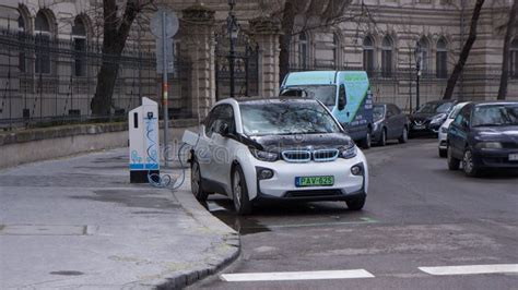 Charging Modern Electric Cars On The Street Station In Budapest