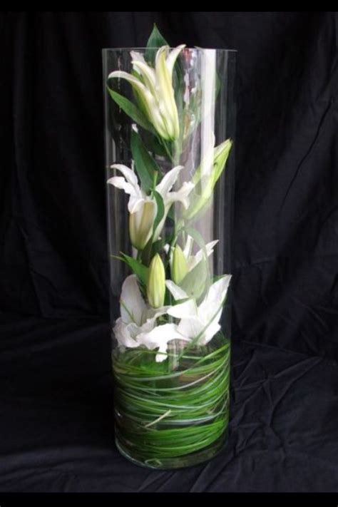 We carry hundreds of wholesale glass vases including flower vases at discount prices. Flowers inside glass vase. | Clear glass vases, Vase design
