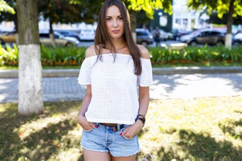 Beautiful Brunette Girl With Country Look Outdoors Shot