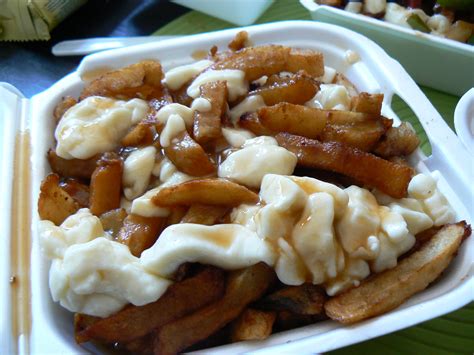 What Is Poutine Canadian Gravy Fries With Cheese Curds News Vdw