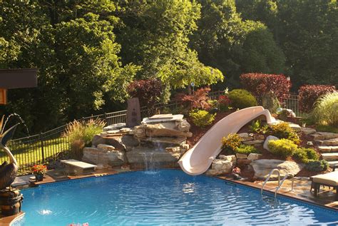 The backyard pool slides are very attractive option for the entertainment and enjoyment. inground pools with rock slides | Subscribe to our Blog ...