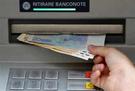 Credit card cash withdrawal refers to the ability to take out cash from an atm. Withdraw Money In Banknotes From An ATM Stock Image - Image of cards, bank: 41864353