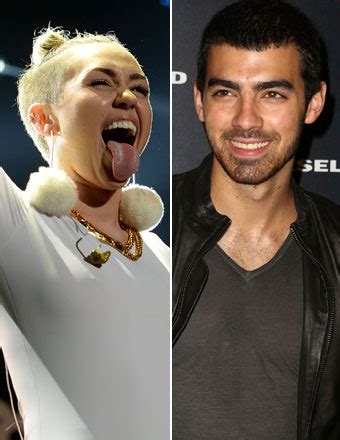 Miley Cyrus Joe Jonas Kissing Vs Model And Naked Adore You Video Extratv Com