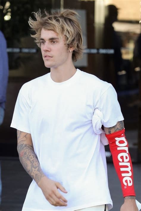 justin bieber s long hair photos of biebs new shaggy ‘do hollywood life