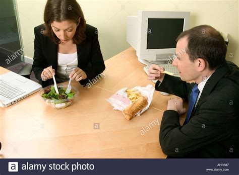 Businesspeople Eating Lunch Stock Photo Alamy