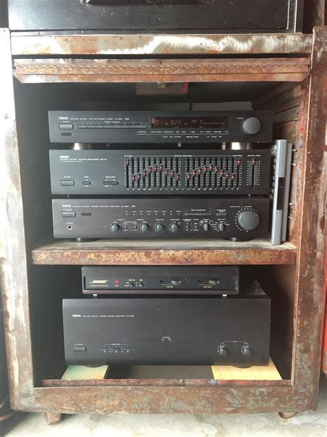Get the wire rack system to hang glasses from the first shelve and put wine bottle holders in the others. Repurposed tool chest stereo cabinet | Stereo cabinet ...