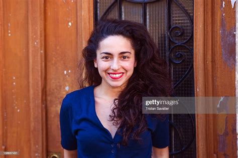 Young Italian Woman With Long Black Curly Hair High Res Stock Photo