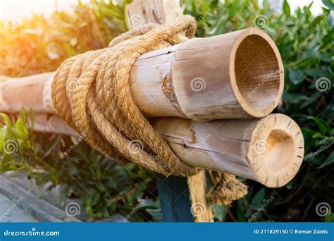 Bamboo Poles Tied By A Thick Rope Stock Photo Image Of Dark Material