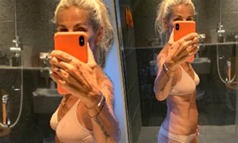 Ulrika Jonsson Draws Attention To Her Trim Figure As She Poses For A