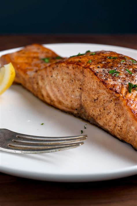 Add the salmon filets and turn to coat in the oil; How to Cook Salmon - NYT Cooking