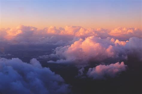 Hd Wallpaper Aerial Shot Capturing The Clouds In The Sky At Sunset