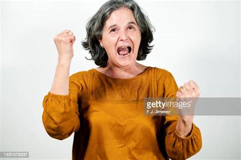 Excited Older Woman Background Photos Et Images De Collection Getty Images