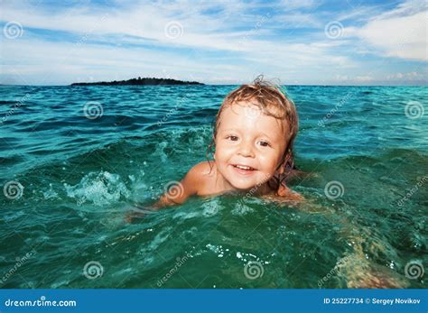 Kid Swimming In The Sea Stock Photo Image Of Leisure 25227734