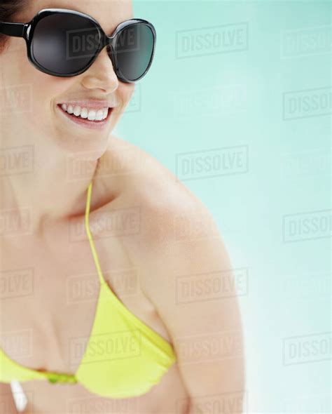 Brunette Wearing Bikini And Sunglasses Stock Photo Dissolve