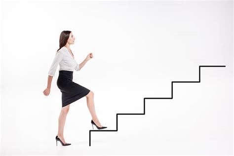 Businesswoman Climbing Stairs Stock Photos Pictures And Royalty Free