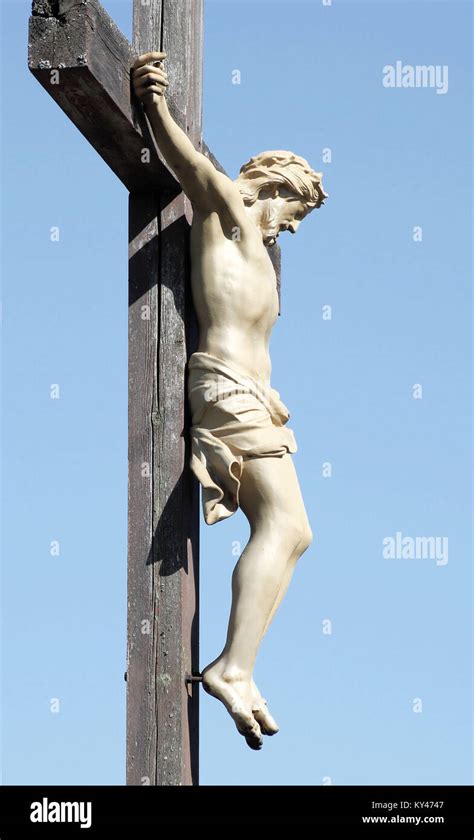 The Crucifixion Statue Of Christ Nailed To A Wooden Cross Stock Photo