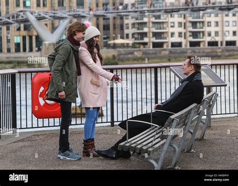 Liam Neeson Olivia Olsen And Thomas Brodie Sangster Film A Scene For A Short Of Love Actually