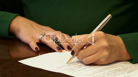 Woman notarizing a document: Lizenzfreie Stock Videos und Clips