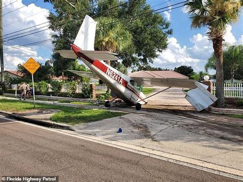 Terrifying Moment Small Plane Crashes Into Orlando Highway And Skids On