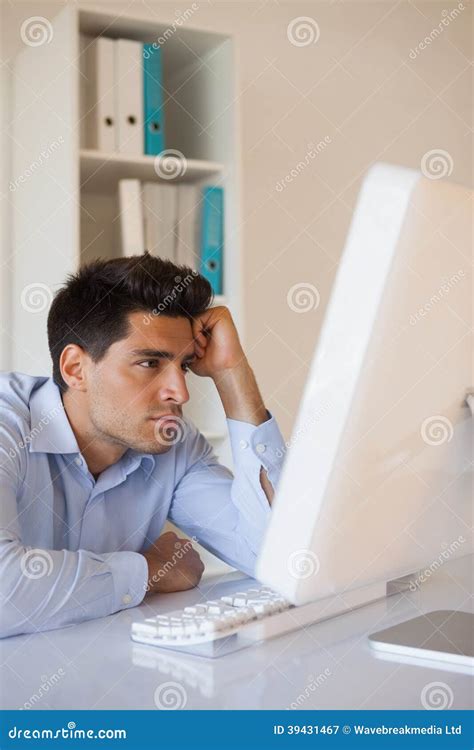 Casual Businessman Slumped At His Desk Stock Image Image Of Computer